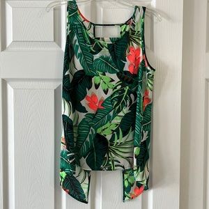 SALE. Bright Hawaiian style top. Shorter in front. Long tails in back